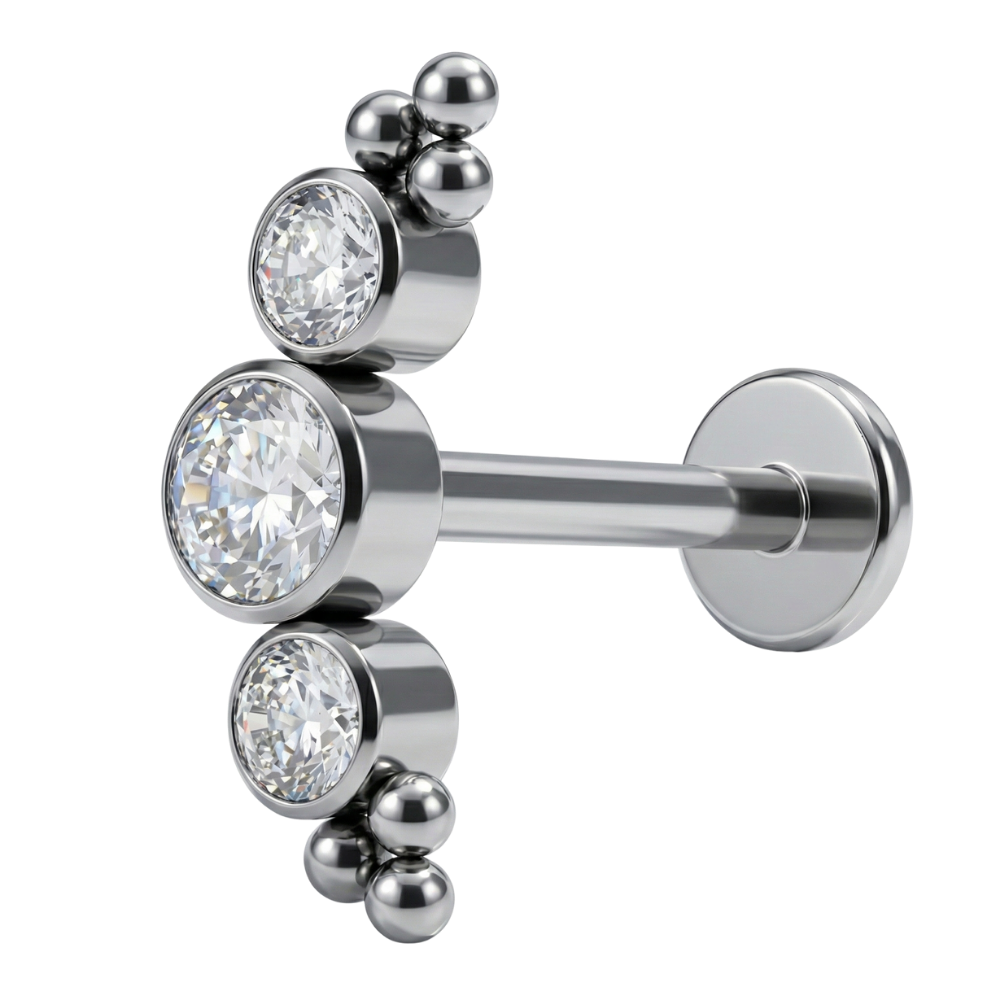 Labret decorativo de titanio - Arco con circonitas cúbicas y bolas
