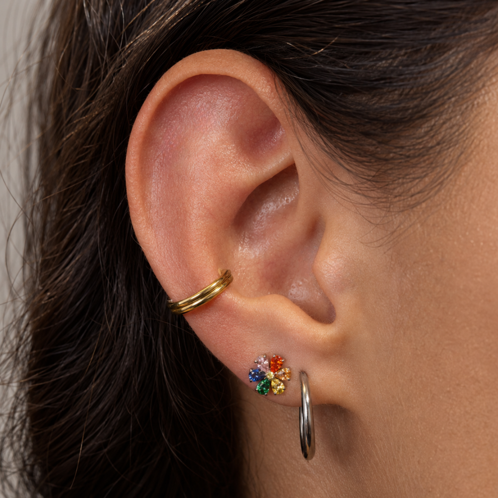 modelo planetario piercing labret colorido