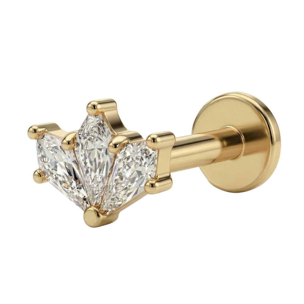 labret de titanio con una hilera de circonitas doradas